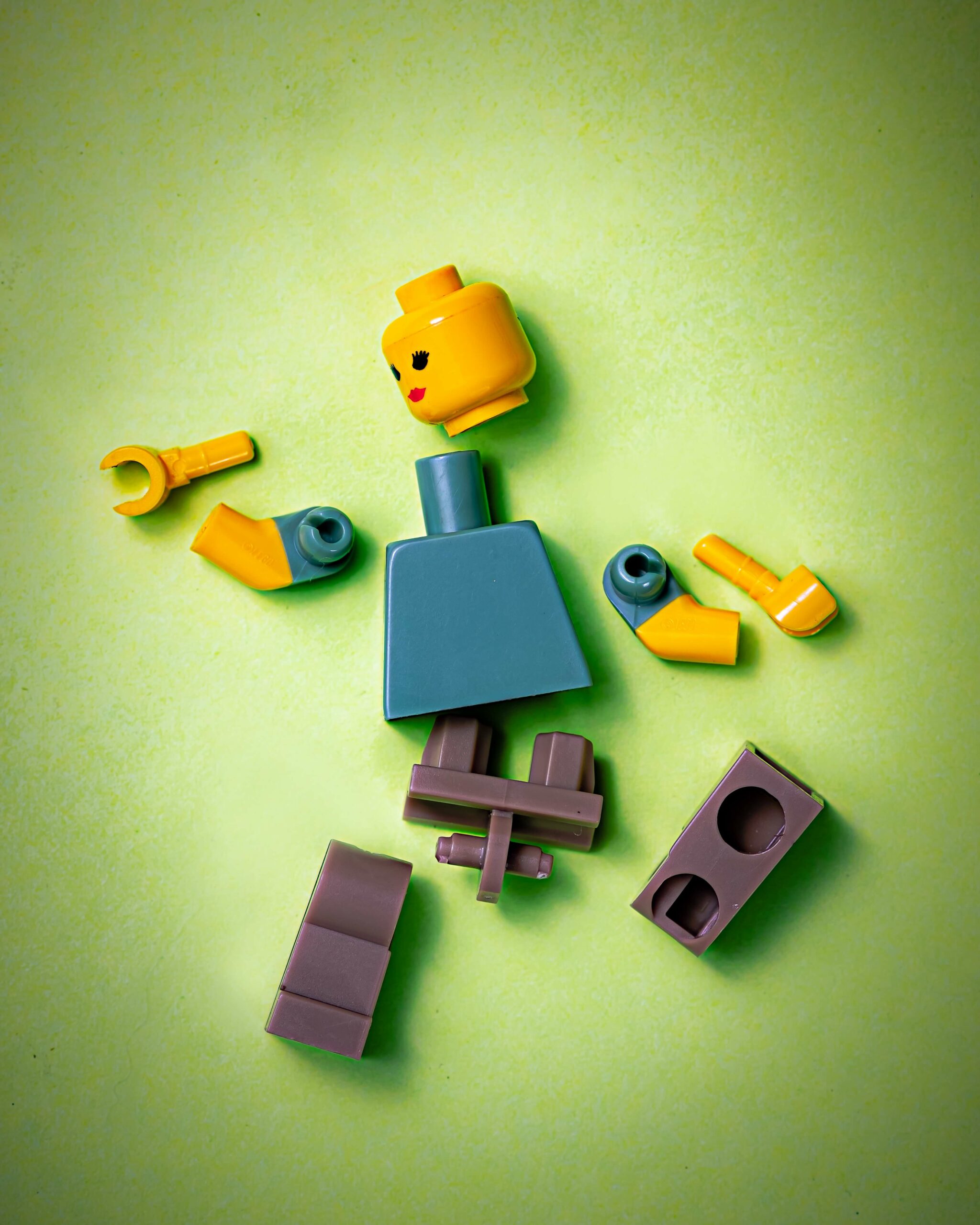 Lego man in pieces