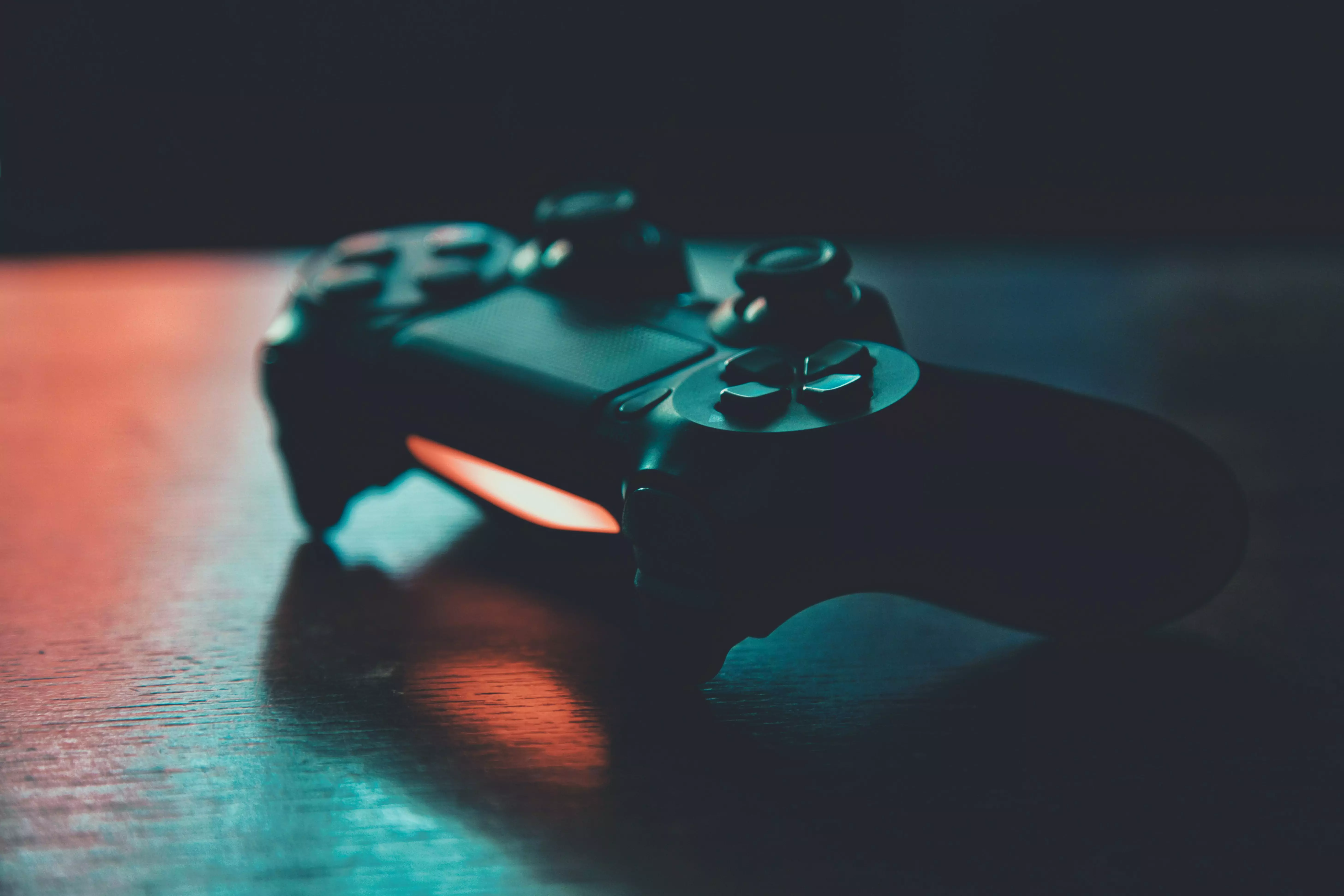 Playstation controller sitting on a table